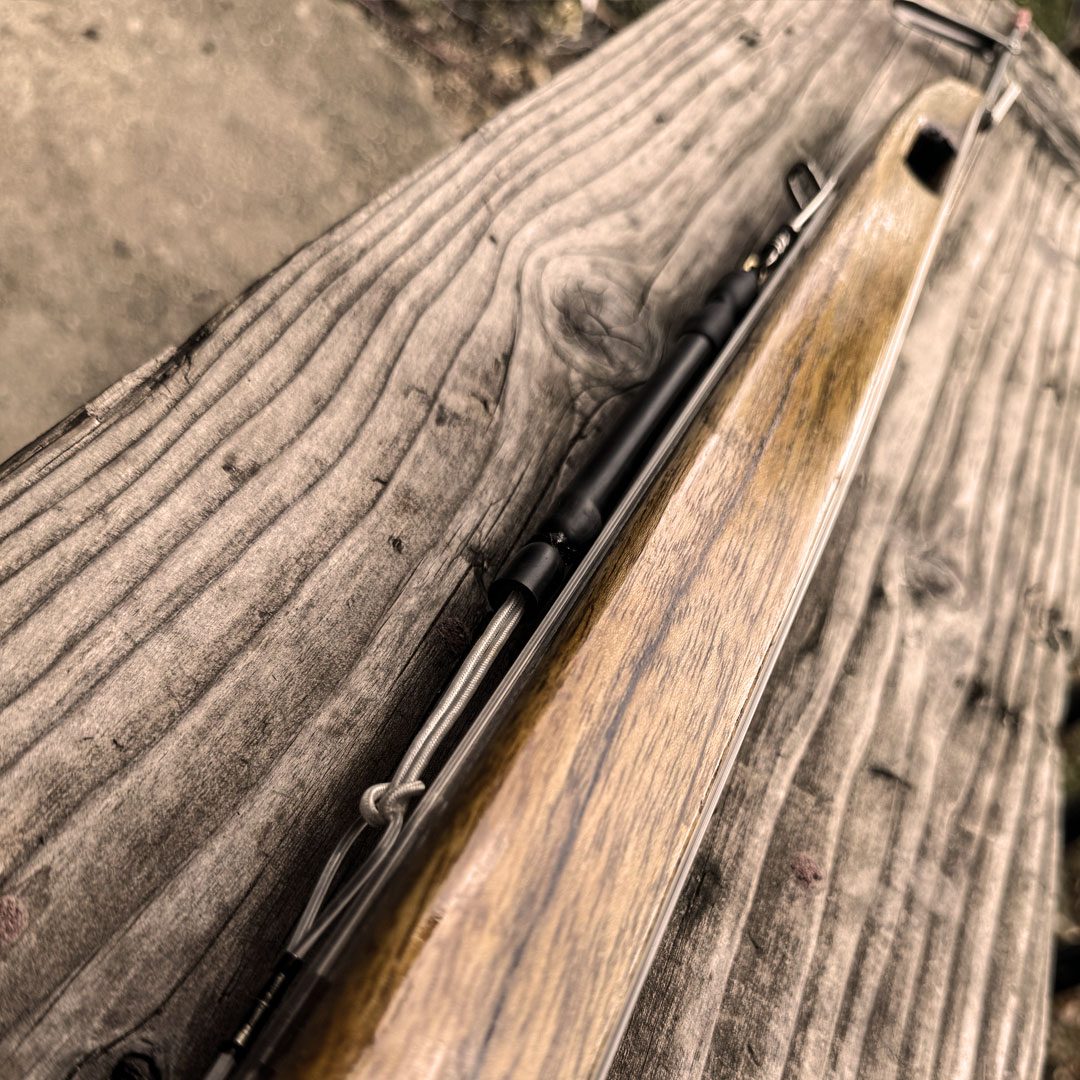 Hangon 55 — Costa Rican teak grain detail, Booth Spearguns